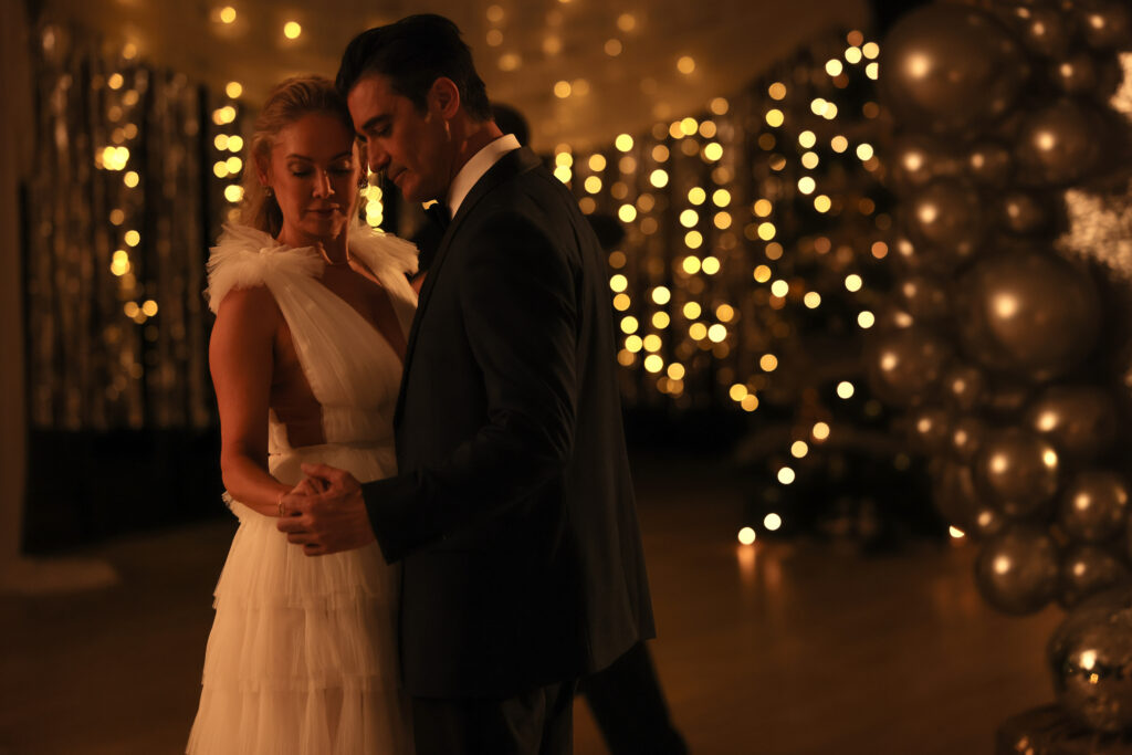Kym Johnson Herjavec and Gilles Marini dancing in Christmas in the Ballroom.
